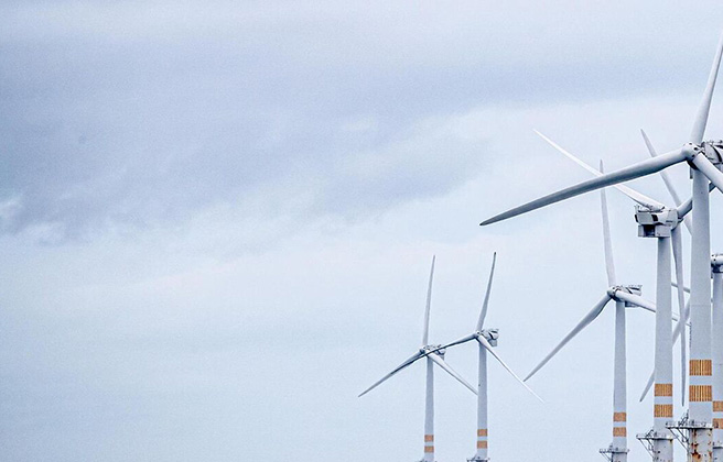 Wind turbines installed in the ocean.