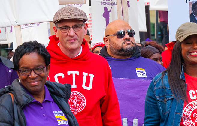 Chicago Teachers Union members marching in a protest.