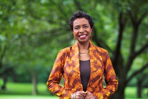 Portrait of Representative Yvette Clark standing outside.